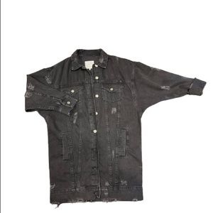 The ultimate oversized, distressed jean jacket. Size S, limited wear.